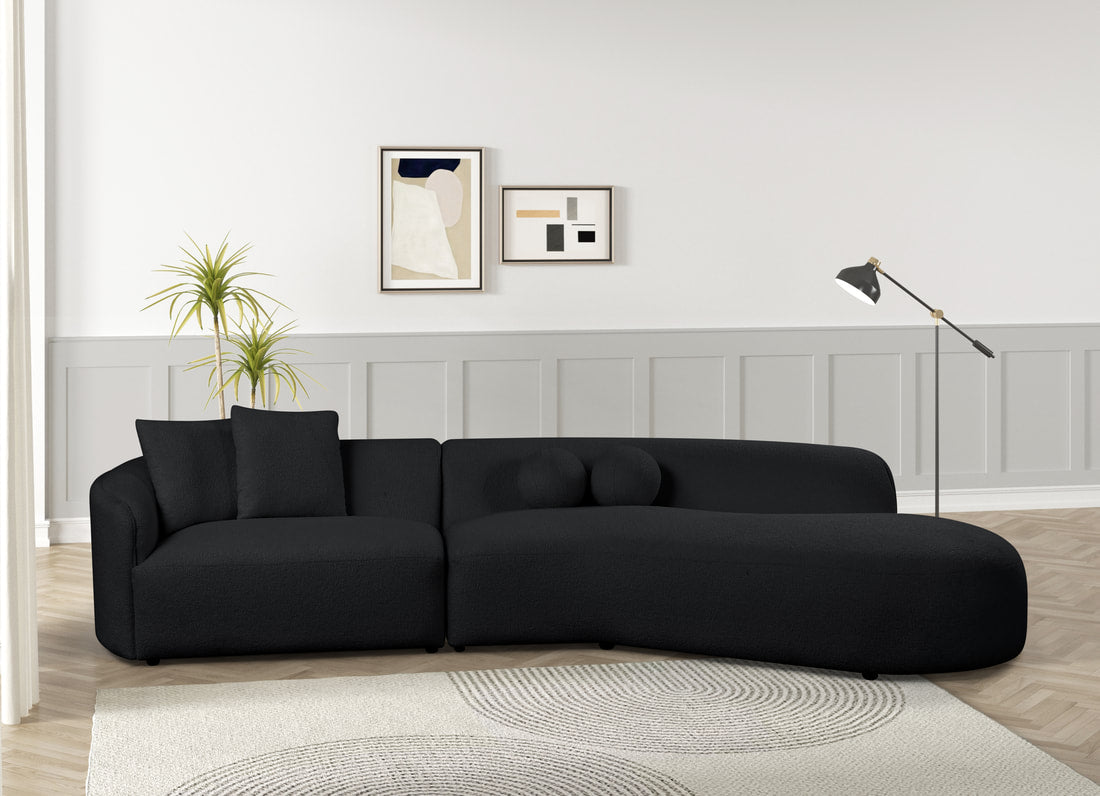 Mia Black Sectional — 132" Wide with Chaise